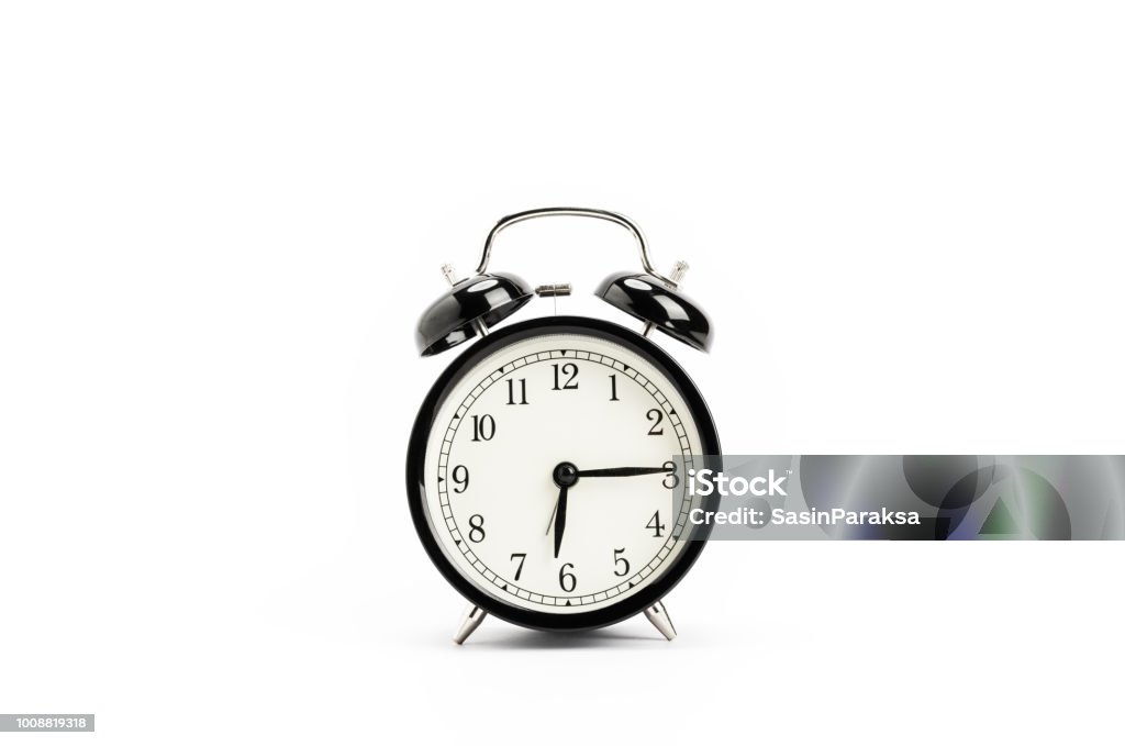 Vintage alarm clock, isolated on white background Alarm Clock Stock Photo