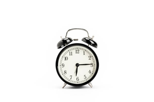 Vintage alarm clock, isolated on white background stock photo