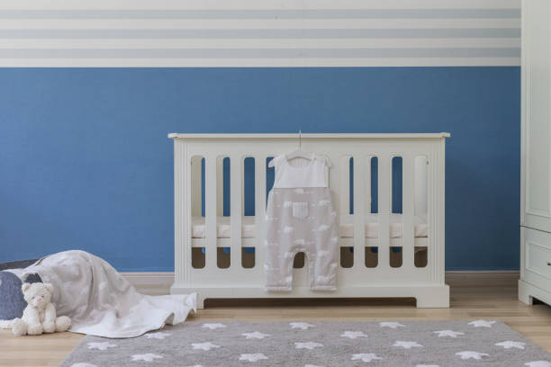 istock Baby bedroom with white teddy bear 1008825986