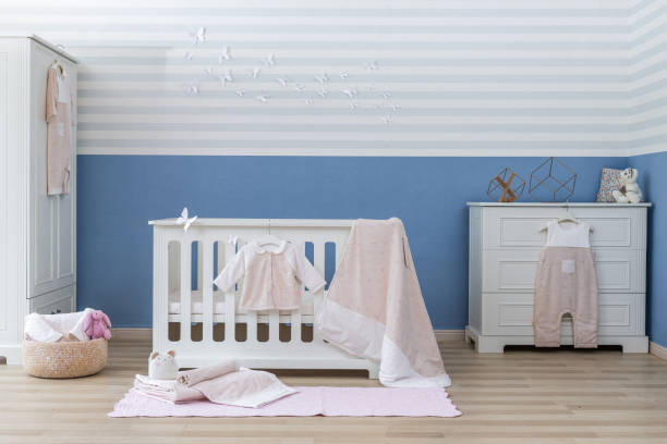 istock Baby bedroom with white teddy bear 1008825998