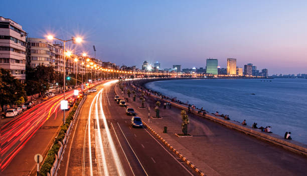 Panoramic View of Marine Drive at dusk, Mumbai, India Panoramic View of Marine Drive at dusk, Mumbai, India shot in long exposure. arabian sea photos stock pictures, royalty-free photos & images