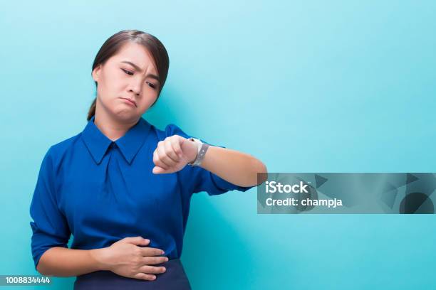 Hungry Woman On Isolated Background Stock Photo - Download Image Now - Hungry, Abdomen, Stomach