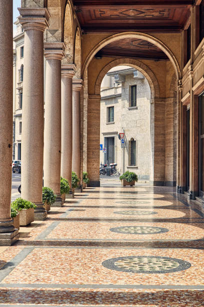 Colonnade with arches view from the inside in the center of Milan, Italy stock photo