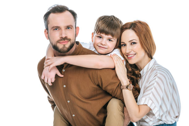 happy parents with adorable little son smiling at camera isolated on white - boyhood imagens e fotografias de stock