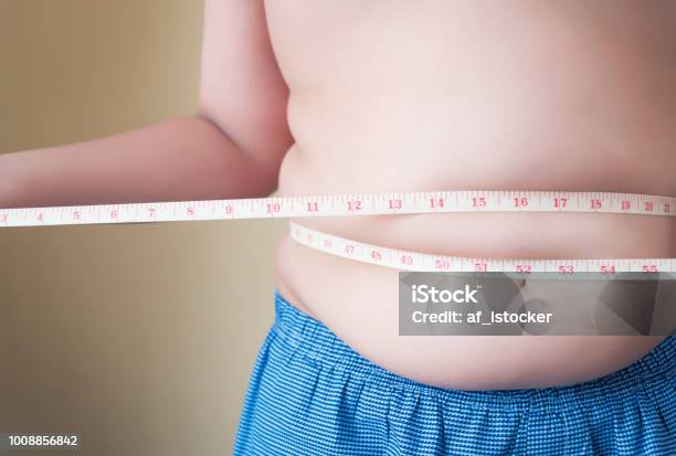 Fat Boy With Overweight Checking Stock Photo - Download Image Now - Overweight, Diabetes, People