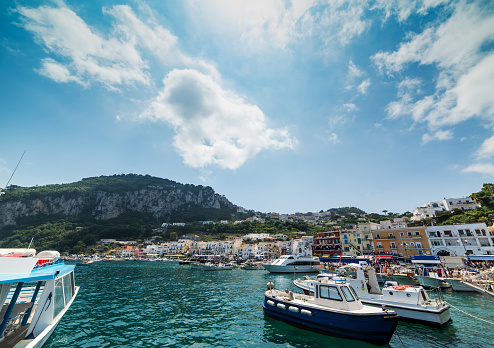 Boats in world famous Amalfi harbor. Campania, Italy