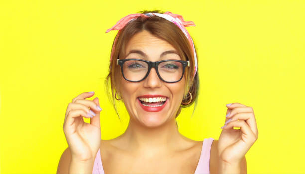 istock Smiling woman posing in glasses 1008876084