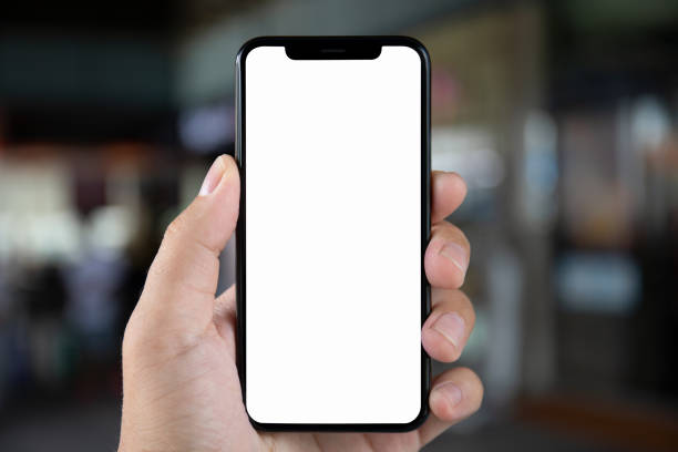 istock man hand holding phone with isolated screen on background city 1008876416