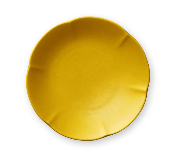 istock Empty yellow plate with wavy edge, Frilled Plate, View from above isolated on white background with clipping path 1008876968