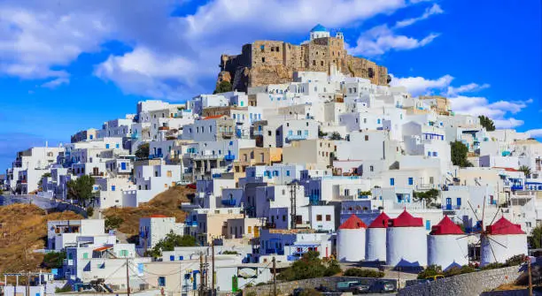 Photo of beautiful Astypalea island - view of old castle and Chora village with a windmills, Greece