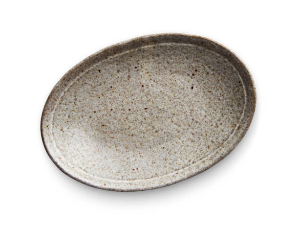 istock Oval ceramic plate, Empty plate with granite texture, View from above isolated on white background with clipping path 1008891790
