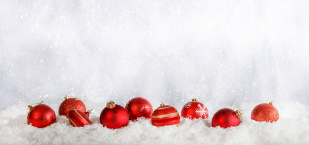 istock Red Christmas balls, cold winter background 1008906490