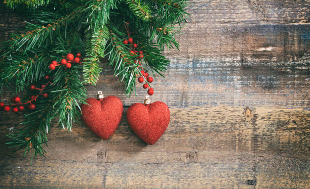 Christmas red hearts and green garland