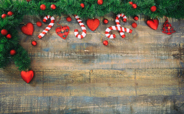 istock Christmas ornaments and green garland 1008909264