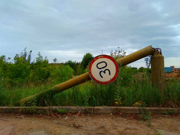 istock The fallen concrete column with a traffic sign 