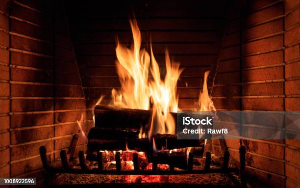 Burning Fireplace At Home Stock Photo - Download Image Now - Fireplace, Fire - Natural Phenomenon, Vacations