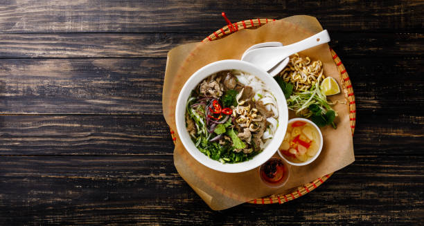 istock Pho Bo vietnamese Soup with beef in tray 1008930018
