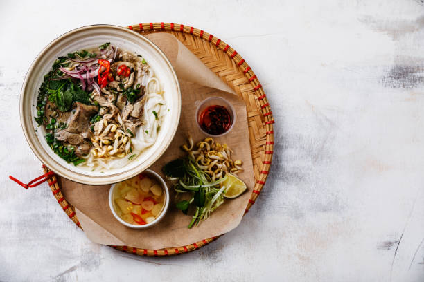 istock Pho Bo vietnamese Soup with beef in tray 1008930084