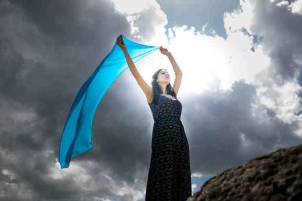 istock woman meditating in nature 1008945204