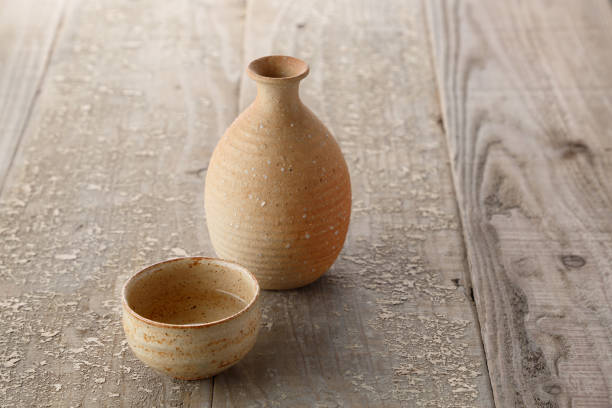 istock Old wooden table and sake 1008957806