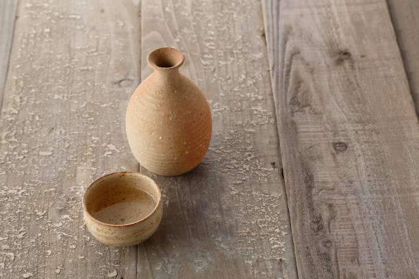 istock Old wooden table and sake 1008957822