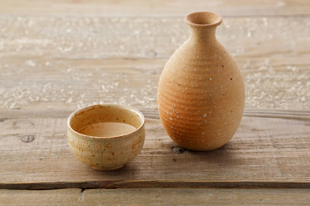 istock Old wooden table and sake 1008957834