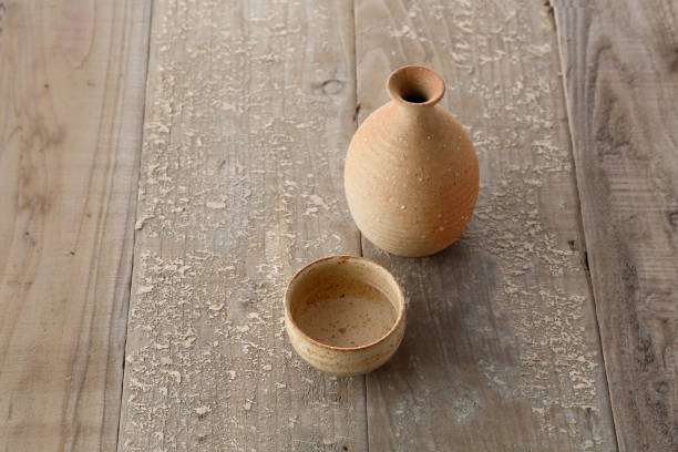 istock Old wooden table and sake 1008957922
