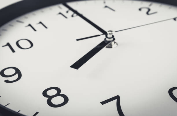 istock Close up of clock with selective focus at 8 Oclock 1008961036