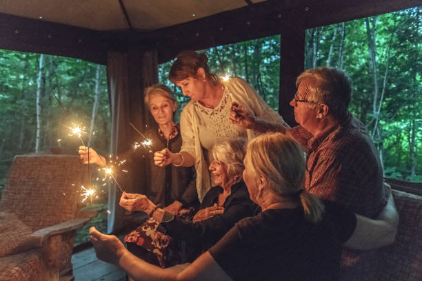 istock Good Old Friends lighting sparklers 1008973886