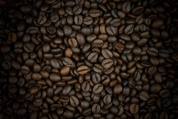 istock roasted coffee beans with vignette, can be used as a background 1008978604