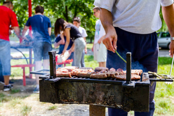 istock Turning delicious juicy minced meat on barbecue 1008979204
