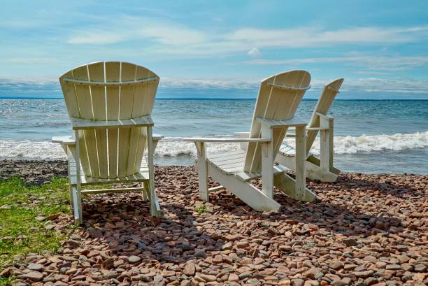 istock High Back Chairs on Rocky Beach on Lake Superior 1008991524