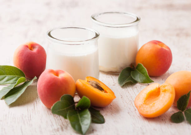 istock Fresh cream dessert with raw organic apricots 1008991544
