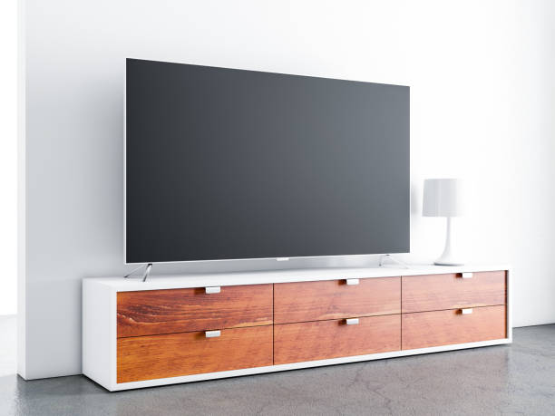 smart tv mockup su ufficio di legno in camera bianca - television stand foto e immagini stock