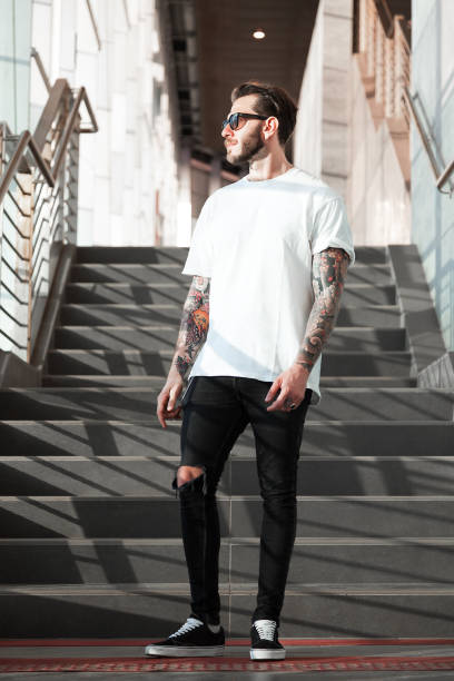 istock Portrait of tattooed young man 1008993872