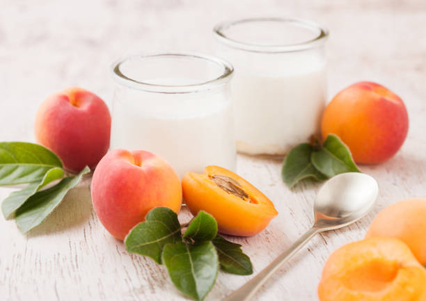 istock Fresh cream dessert with raw organic apricots 1008994046