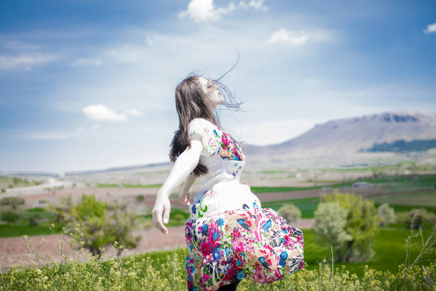 istock female model photography between flowers 1009016638