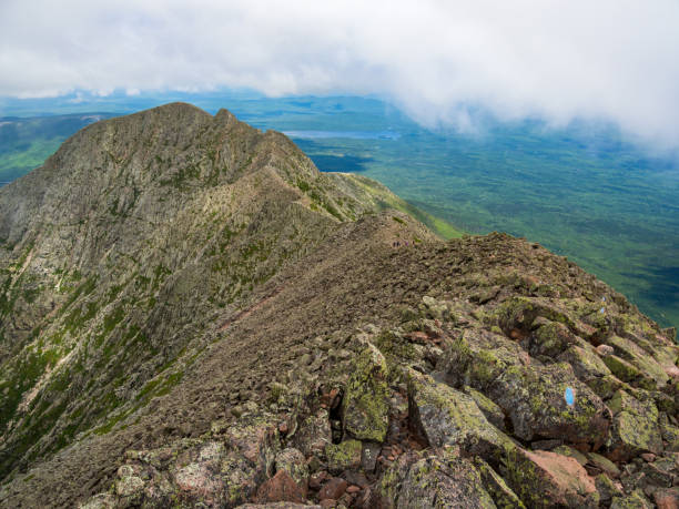 Mountain Ridge and Valley, Knife's Edge Trail, Katahdin, Maine A view of the arm of Katahdin in Baxter State Park, known as the Knife's Edge, Pamola Peak and surrounding valley. mauer park stock pictures, royalty-free photos & images