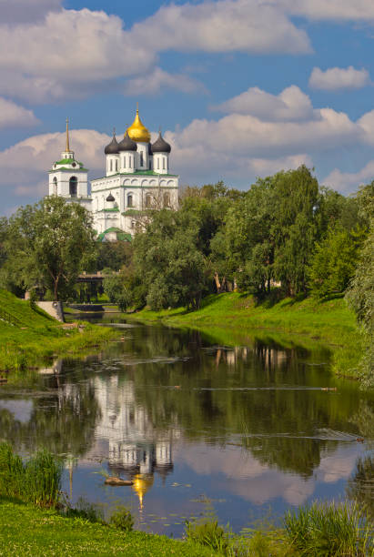 istock Cityscape with Trinity cathedral and its reflection in the river in Pskov, Russia 1009023550