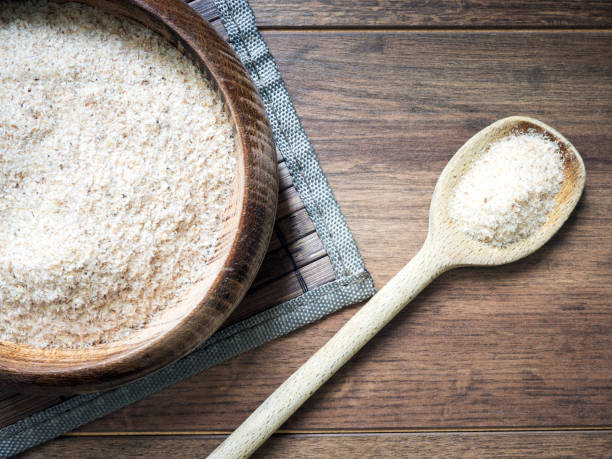 istock Psyllium husk (ispaghula) on dark wooden background 1009027986