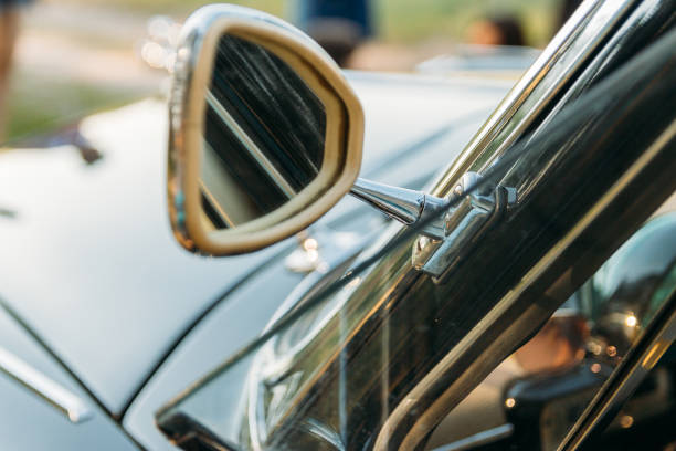 istock side view fo classic van car.side of retro car, old model, old model, side mirror of triangular shape 1009036438
