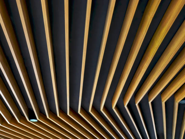 istock Low Angle View of Ceiling Decorative Wooden Planks with Lamp 1009045948