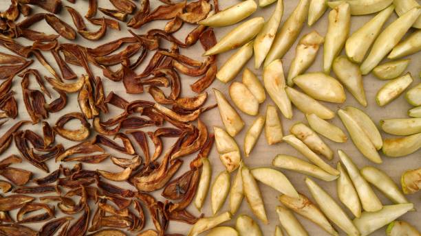 istock Sliced pears. A background of dried fruits. 1009048572