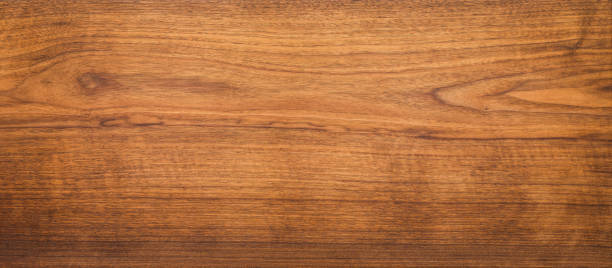 istock Walnut wood texture. Super long walnut planks texture background. 1009048690