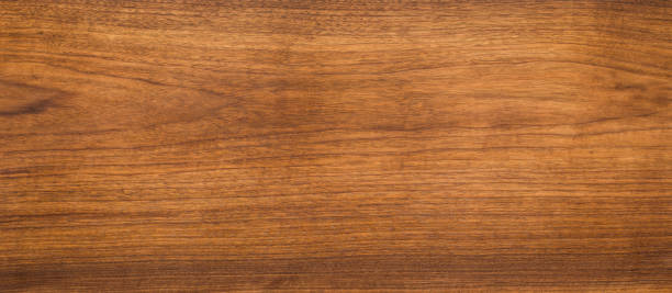 istock Walnut wood texture. Super long walnut planks texture background. 1009049038