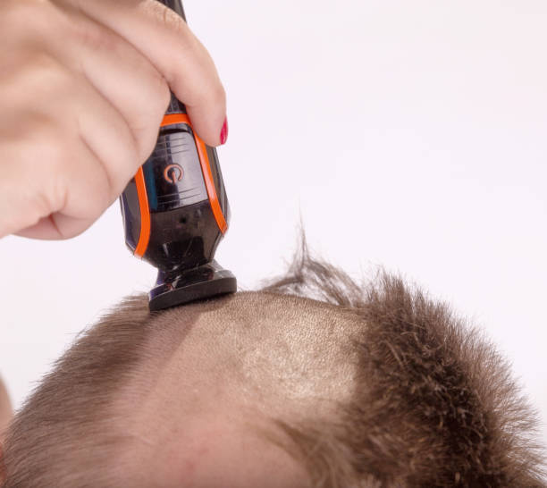 istock shaving head with electric razor, trimmer 1009059924
