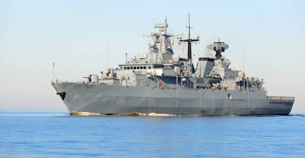 istock Large military ship in the open sea on a clear day 1009063658