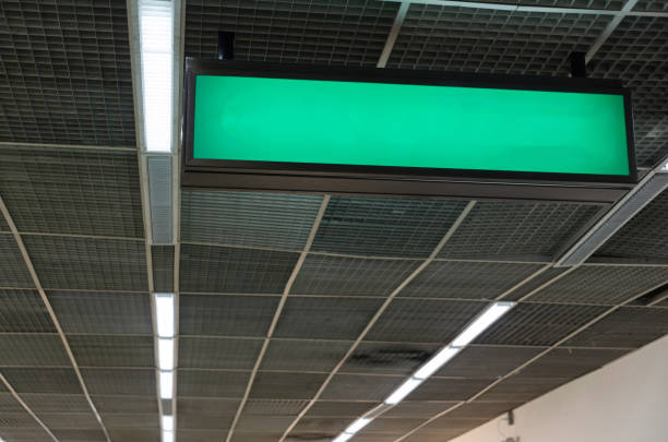 istock hanging blank advertising billboard or light box showcase on wall at airport or subway train station, copy space for your text message or media content, advertisement, commercial and marketing concept 1009071752