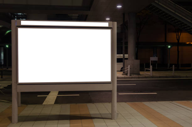 istock blank advertising billboard or light box with copy space for your text message or media and content in bus stop on street, information board, banner, marketing and advertising concept 1009071754