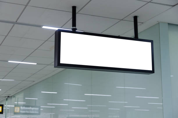 istock hanging blank advertising billboard or light box showcase on wall at airport or subway, copy space for your text message or media content, advertisement, commercial, marketing concept 1009071762